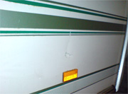 Damage to Caravan side panel